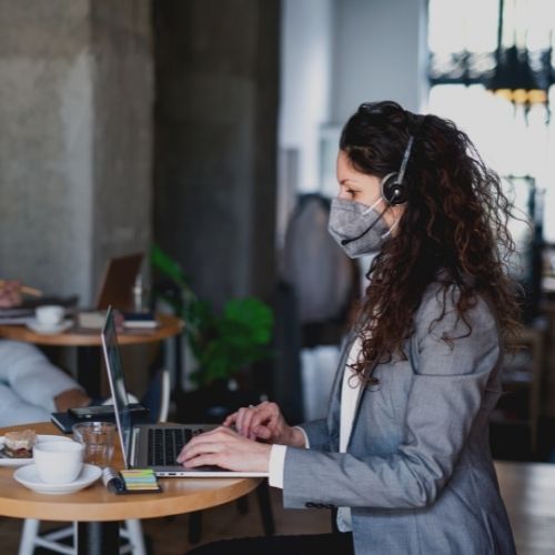 woman wearing mask on video call