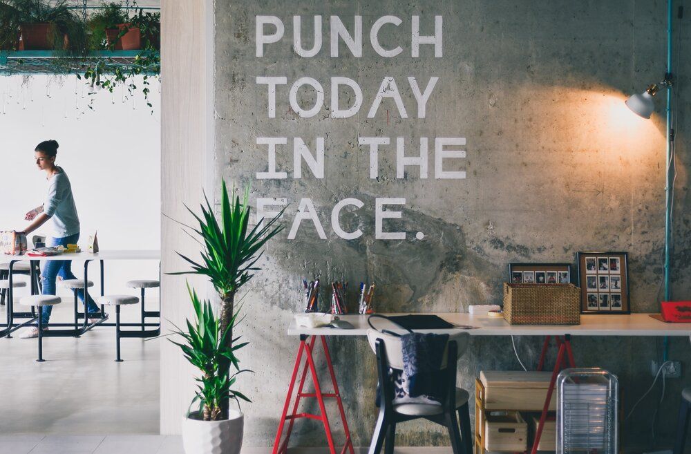 punch today in the face written on a diner wall