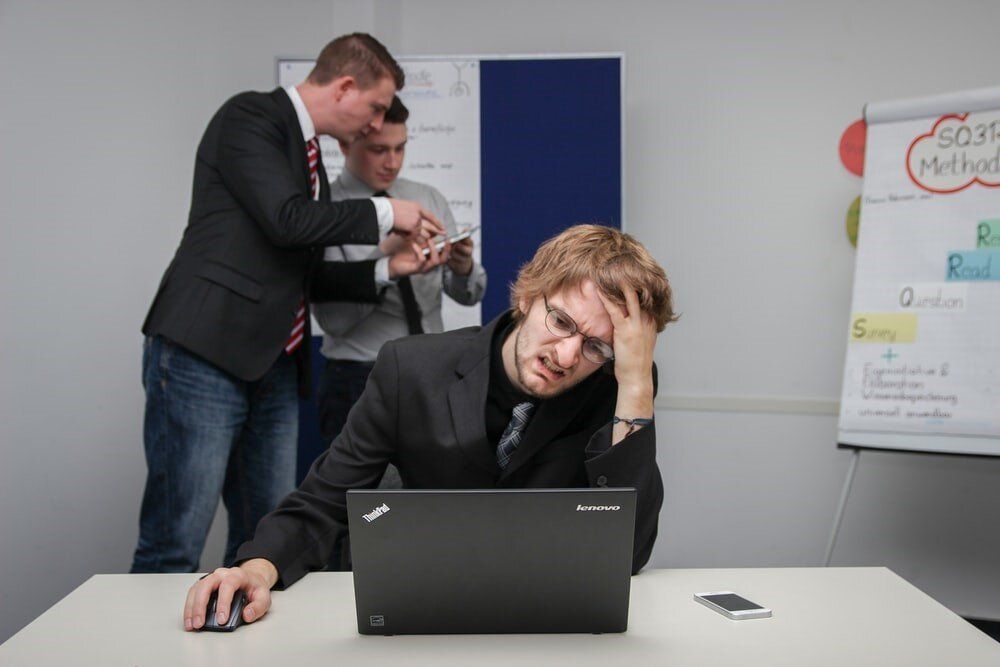 frustrated man with his laptop